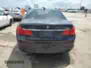 2011 BMW 7 Series 750i with VIN WBAKA8C59BCY36657, listed as a Copart auction lot 61484925 with 174,605 mi miles and Salvage title. Bid and sale history available at DreamBid. Image 6.