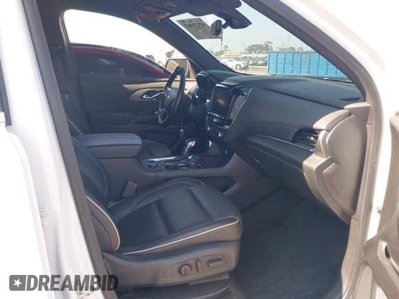 2023 Chevrolet Traverse Premier с VIN 1GNEVKKW9PJ191398, выставлен на аукционе IAAI как лот 42431067 с пробегом 22 464 миль миль и . История ставок и продаж доступна на DreamBid. Изображение 5.