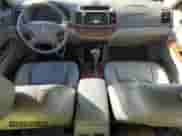 2003 Toyota Camry LE с VIN 4T1BF30K23U045444, выставлен на аукционе Copart как лот 69788145 с пробегом 204 433 миль миль и Списание • Salvage title. История ставок и продаж доступна на DreamBid. Изображение 8.