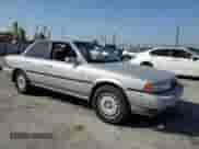 1990 Toyota Camry with VIN JT2VV22E3L3003353, listed as a Copart auction lot 68489125 with 131,662 mi miles and Clean title. Bid and sale history available at DreamBid. Image 4.