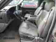 2003 Chevrolet Tahoe LT с VIN 1GNEK13Z23J201906, выставлен на аукционе Copart как лот 60144165 с пробегом 126 489 миль миль и Списание • Salvage title. История ставок и продаж доступна на DreamBid. Изображение 7.