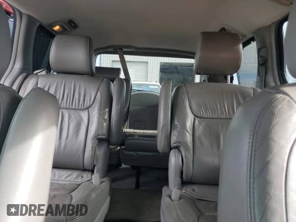 2010 Toyota Sienna XLE с VIN 5TDYK4CC1AS342159, выставлен на аукционе Copart как лот 84412115 с пробегом 214 042 миль миль и Списание • Salvage title. История ставок и продаж доступна на DreamBid. Изображение 10.