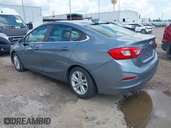 2019 Chevrolet Cruze LT z VIN 1G1BE5SM4K7139171, wystawiony jako IAAI lot #43127377 z przebiegiem 44 293 mil mil oraz . Historia ofert i sprzedaży dostępna na DreamBid. Obrazek 3.