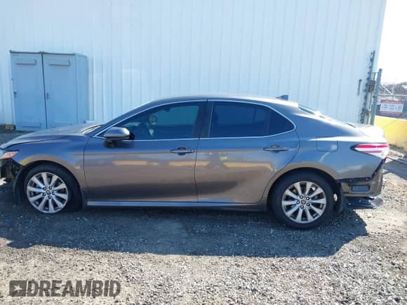 2019 Toyota Camry SE z VIN 4T1B11HK5KU750793, wystawiony jako IAAI lot #43209555 z przebiegiem 144 832 mil mil oraz . Historia ofert i sprzedaży dostępna na DreamBid. Obrazek 14.