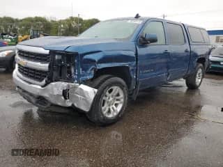 2018 Chevrolet Silverado 1500 LT с VIN 3GCUKREC1JG433357, выставлен на аукционе Copart как лот 90292415 с пробегом 76 435 миль миль и Списание • Salvage title. История ставок и продаж доступна на DreamBid. Изображение 1.