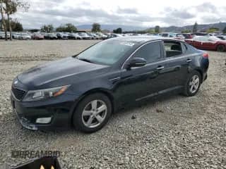 2014 Kia Optima LX z VIN 5XXGM4A77EG339026, wystawiony jako Copart lot #86504145 z przebiegiem 182 550 mil mil oraz Czysty tytuł • Clean title. Historia ofert i sprzedaży dostępna na DreamBid. Obrazek 1.