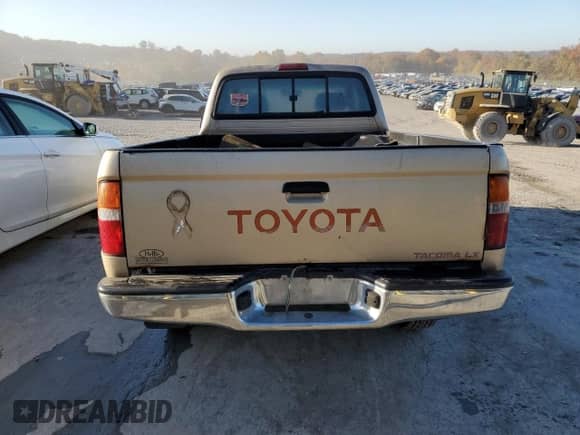 1997 Toyota Tacoma z VIN 4TAWM72N3VZ308584, wystawiony jako Copart lot #76939654 z przebiegiem 259 695 mil mil oraz Szkoda całkowita • Salvage title. Historia ofert i sprzedaży dostępna na DreamBid. Obrazek 6.