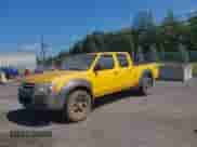 2003 Nissan Frontier XE z VIN 1N6ED29Y73C444734, wystawiony jako IAAI lot #42856079 z przebiegiem 163 764 mil mil oraz . Historia ofert i sprzedaży dostępna na DreamBid. Obrazek 2.