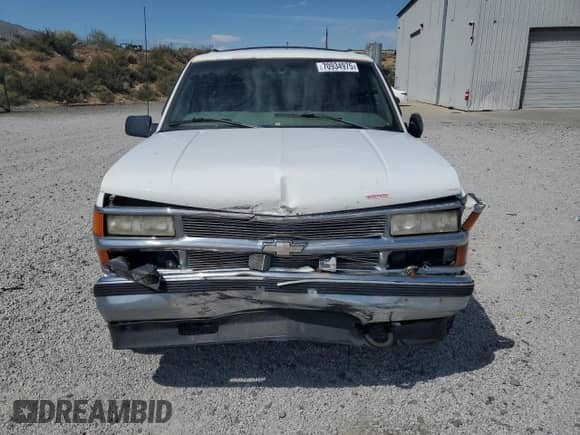 1999 Chevrolet Tahoe z VIN 1GNEK13R2XJ394497, wystawiony jako Copart lot #70934975 z przebiegiem 315 294 mil mil oraz Szkoda całkowita • Salvage title. Historia ofert i sprzedaży dostępna na DreamBid. Obrazek 5.