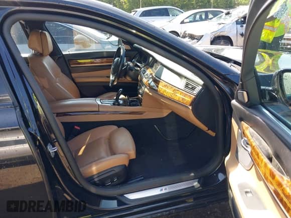 2014 BMW 7 Series ALPINA B7 with VIN WBAYE8C54ED134792, listed as a IAAI auction lot 42525127 with 96,631 mi miles and . Bid and sale history available at DreamBid. Image 5.