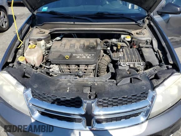 2012 Dodge Avenger SE with VIN 1C3CDZAB5CN310470, listed as a Copart auction lot 71458285 with 120,033 mi miles and Salvage title. Bid and sale history available at DreamBid. Image 11.