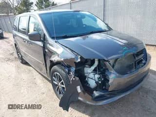 2014 Dodge Grand Caravan SE with VIN 2C4RDGBG4ER411896, listed as a IAAI auction lot 42106651 with 123,321 mi miles and . Bid and sale history available at DreamBid. Image 1.