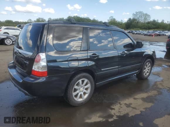 2007 Subaru Forester X with VIN JF1SG65687H716263, listed as a Copart auction lot 71348105 with 234,925 mi miles and Salvage title. Bid and sale history available at DreamBid. Image 3.