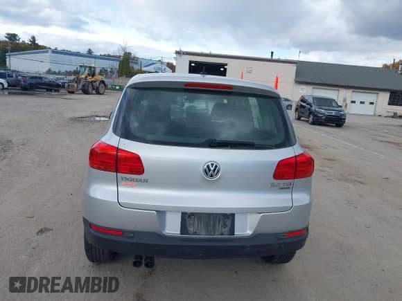2014 Volkswagen Tiguan S with VIN WVGBV3AXXEW596502, listed as a IAAI auction lot 43538779 with 111,908 mi miles and . Bid and sale history available at DreamBid. Image 16.
