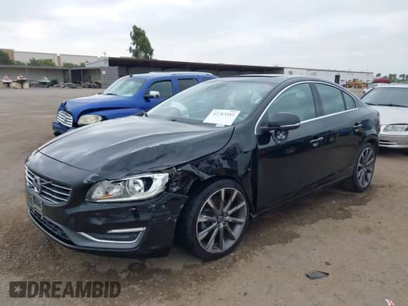 2015 Volvo S60 T5 Drive-E Premier with VIN YV140MFK4F1352447, listed as a IAAI auction lot 42783582 with 72,780 mi miles and . Bid and sale history available at DreamBid. Image 6.