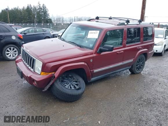 2007 Jeep Commander Limited with VIN 1J8HG58P77C573878, listed as a IAAI auction lot 41843633 with 154,584 mi miles and . Bid and sale history available at DreamBid. Image 2.