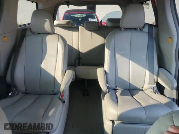 2013 Toyota Sienna XLE with VIN 5TDDK3DC4DS066975, listed as a Copart auction lot 65800415 with 136,892 mi miles and Salvage title. Bid and sale history available at DreamBid. Image 10.