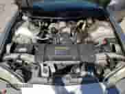 2000 Chevrolet Camaro z VIN 2G1FP22K6Y2103412, wystawiony jako Copart lot #70040684 z przebiegiem 97 796 mil mil oraz Czysty tytuł • Clean title. Historia ofert i sprzedaży dostępna na DreamBid. Obrazek 11.