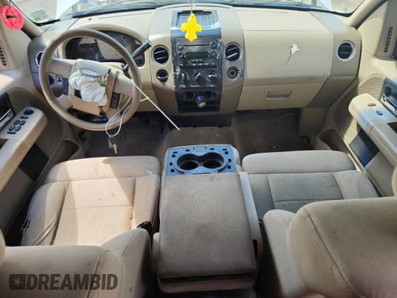 2007 Ford F-150 STX with VIN 1FTRX12W57FA37403, listed as a Copart auction lot 84213265 with 2,342,455 mi miles and Salvage title. Bid and sale history available at DreamBid. Image 8.