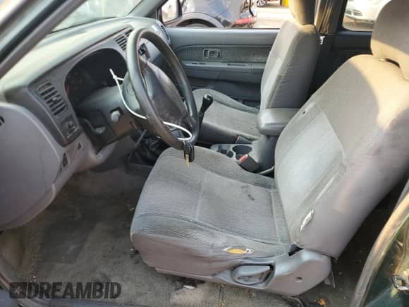 2000 Nissan Frontier XE with VIN 1N6ED27Y9YC425953, listed as a Copart auction lot 68830265 with 317,976 mi miles and Clean title. Bid and sale history available at DreamBid. Image 7.