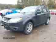 2012 Subaru Forester X z VIN JF2SHABC9CG464917, wystawiony jako IAAI lot #43517197 z przebiegiem 162 536 mil mil oraz . Historia ofert i sprzedaży dostępna na DreamBid. Obrazek 2.