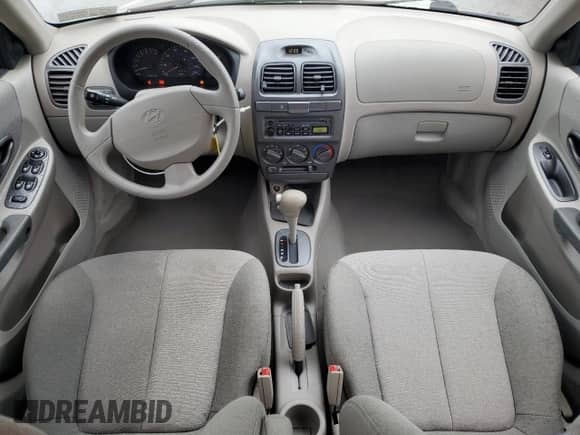 2002 Hyundai Accent GL z VIN KMHCG45C12U355561, wystawiony jako Copart lot #54546945 z przebiegiem 22 893 mil mil oraz Szkoda całkowita • Salvage title. Historia ofert i sprzedaży dostępna na DreamBid. Obrazek 8.