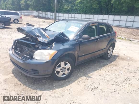 2007 Dodge Caliber with VIN 1B3HB28C67D157236, listed as a IAAI auction lot 42406217 with 214,233 mi miles and . Bid and sale history available at DreamBid. Image 2.