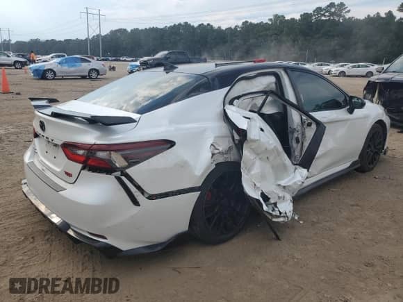 2021 Toyota Camry XSE with VIN 4T1KZ1AK7MU054216, listed as a Copart auction lot 70770935 with 90,877 mi miles and Salvage title. Bid and sale history available at DreamBid. Image 3.