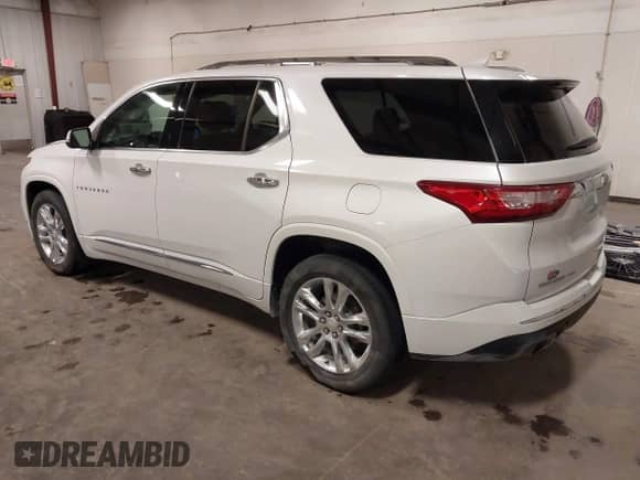 2021 Chevrolet Traverse High Country z VIN 1GNEVNKW0MJ199645, wystawiony jako IAAI lot #43042984 z przebiegiem 106 593 mil mil oraz . Historia ofert i sprzedaży dostępna na DreamBid. Obrazek 3.