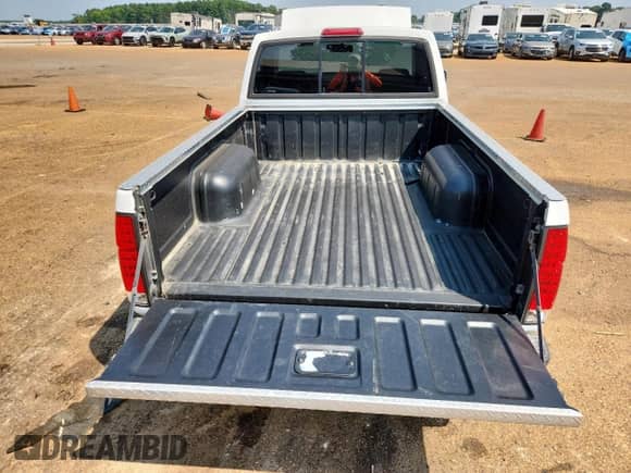 1995 Nissan Frontier z VIN 1N6SD11S4SC421012, wystawiony jako Copart lot #81146785 z przebiegiem 129 528 mil mil oraz Szkoda całkowita • Salvage title. Historia ofert i sprzedaży dostępna na DreamBid. Obrazek 10.