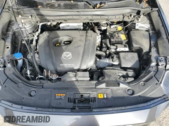 2022 Mazda CX-5 S Preferred with VIN JM3KFBCM9N0604873, listed as a Copart auction lot 87225125 with 24,330 mi miles and Salvage title. Bid and sale history available at DreamBid. Image 12.
