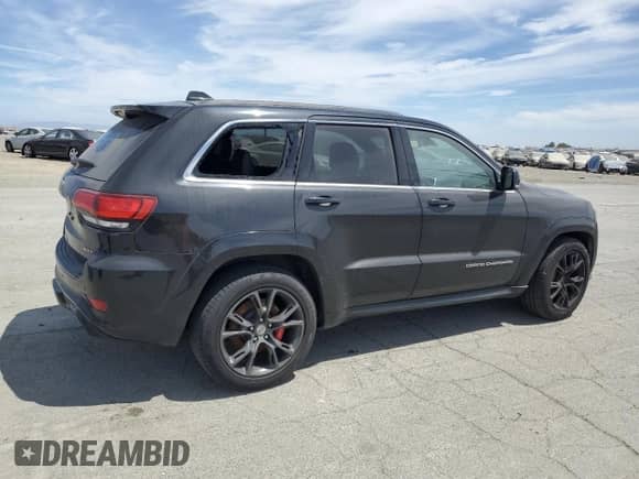 2014 Jeep Grand Cherokee SRT-8 z VIN 1C4RJFDJXEC379766, wystawiony jako Copart lot #63656015 z przebiegiem Nie podano mil oraz Szkoda całkowita • Salvage title. Historia ofert i sprzedaży dostępna na DreamBid. Obrazek 3.