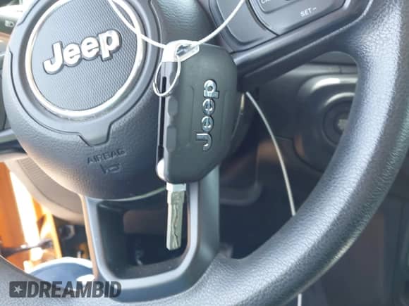 2021 Jeep Wrangler Unlimited Sport Altitude with VIN 1C4HJXDN4MW671222, listed as a IAAI auction lot 42700872 with 49,482 mi miles and . Bid and sale history available at DreamBid. Image 11.