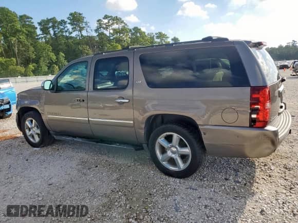 2014 Chevrolet Suburban LTZ z VIN 1GNSCKE04ER208476, wystawiony jako Copart lot #81630985 z przebiegiem 97 425 mil mil oraz Czysty tytuł • Clean title. Historia ofert i sprzedaży dostępna na DreamBid. Obrazek 2.