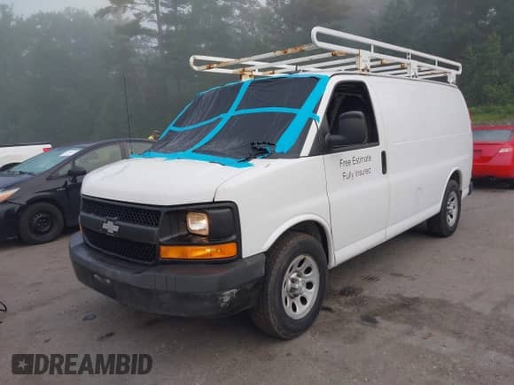 2014 Chevrolet Express Cargo with VIN 1GCSGAFX6E1191777, listed as a IAAI auction lot 42728464 with 168,077 mi miles and . Bid and sale history available at DreamBid. Image 2.