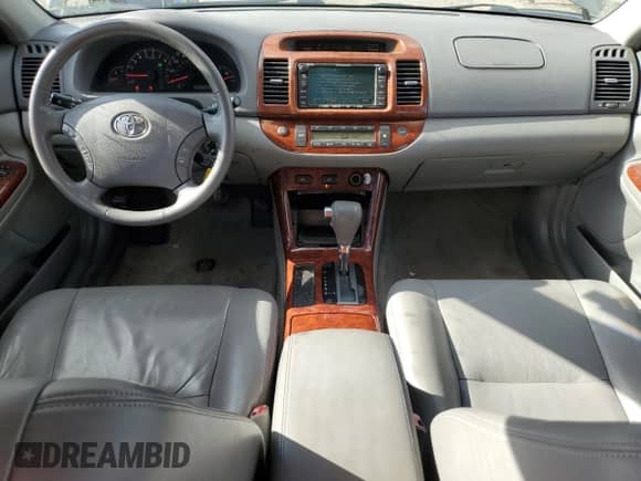 2005 Toyota Camry LE z VIN JTDBF30K250163783, wystawiony jako Copart lot #90110105 z przebiegiem 147 964 mil mil oraz Czysty tytuł • Clean title. Historia ofert i sprzedaży dostępna na DreamBid. Obrazek 8.