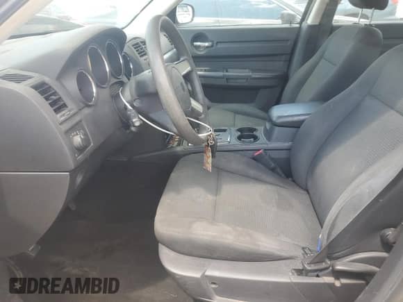 2008 Dodge Charger with VIN 2B3KA43R78H265191, listed as a Copart auction lot 69762205 with 129,658 mi miles and Salvage title. Bid and sale history available at DreamBid. Image 7.