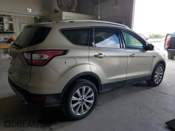 2017 Ford Escape Titanium с VIN 1FMCU0JD8HUE35755, выставлен на аукционе Copart как лот 68698985 с пробегом 111 087 миль миль и Списание • Salvage title. История ставок и продаж доступна на DreamBid. Изображение 3.