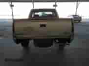 1998 GMC Sierra 1500 z VIN 1GTEC19M6WE521695, wystawiony jako Copart lot #57963205 z przebiegiem 282 910 mil mil oraz Szkoda całkowita • Salvage title. Historia ofert i sprzedaży dostępna na DreamBid. Obrazek 6.