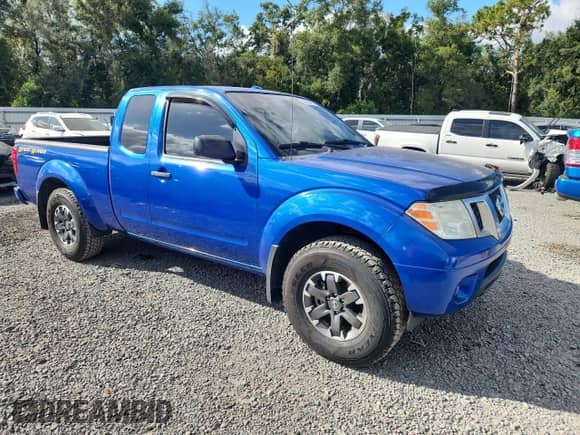 2014 Nissan Frontier SV with VIN 1N6AD0CU3EN744674, listed as a Copart auction lot 87061615 with 253,137 mi miles and Salvage title. Bid and sale history available at DreamBid. Image 4.
