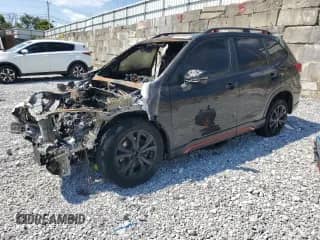 2021 Subaru Forester Special Sports z VIN JF2SKARCXMH521886, wystawiony jako Copart lot #80403935 z przebiegiem Nie podano mil oraz Szkoda całkowita • Salvage title. Historia ofert i sprzedaży dostępna na DreamBid. Obrazek 1.