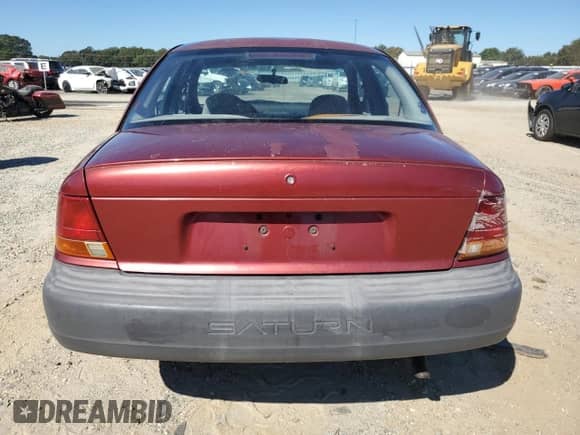 1998 Saturn SL with VIN 1G8ZH528XWZ144301, listed as a Copart auction lot 75918414 with 219,256 mi miles and Salvage title. Bid and sale history available at DreamBid. Image 6.