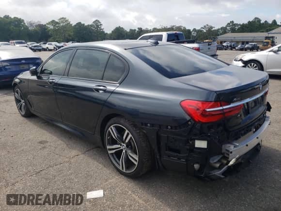 2018 BMW 7 Series ALPINA B7 xDrive with VIN WBA7F2C58JB238844, listed as a Copart auction lot 64817985 with 60,744 mi miles and Salvage title. Bid and sale history available at DreamBid. Image 2.