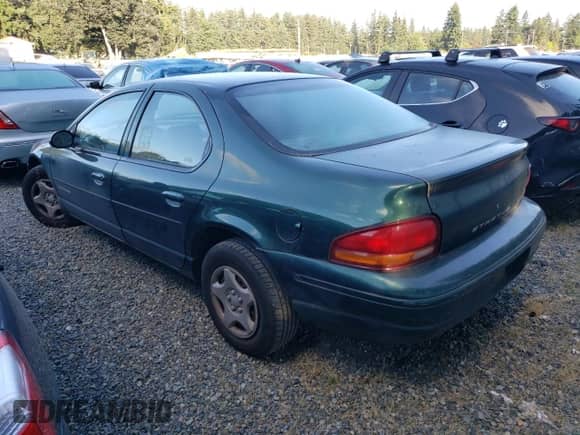 1998 Dodge Stratus with VIN 1B3EJ46X0WN303386, listed as a Copart auction lot 80188805 with 126,228 mi miles and Salvage title. Bid and sale history available at DreamBid. Image 2.