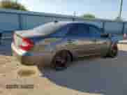 2004 Toyota Camry LE с VIN 4T1BE32K74U923371, выставлен на аукционе Copart как лот 82349615 с пробегом 211 248 миль миль и Списание • Salvage title. История ставок и продаж доступна на DreamBid. Изображение 3.