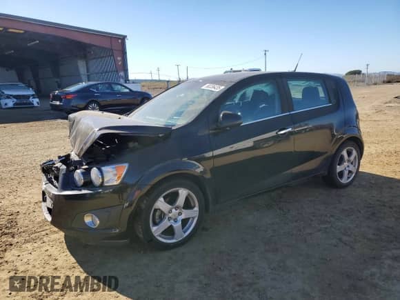 2012 Chevrolet Sonic LTZ with VIN 1G1JE6SH5C4195594, listed as a Copart auction lot 88336435 with 105,112 mi miles and Salvage title. Bid and sale history available at DreamBid. Image 1.