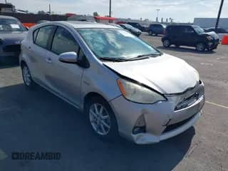 2014 Toyota Prius One z VIN JTDKDTB39E1059717, wystawiony jako IAAI lot #43503866 z przebiegiem 132 202 mil mil oraz . Historia ofert i sprzedaży dostępna na DreamBid. Obrazek 1.