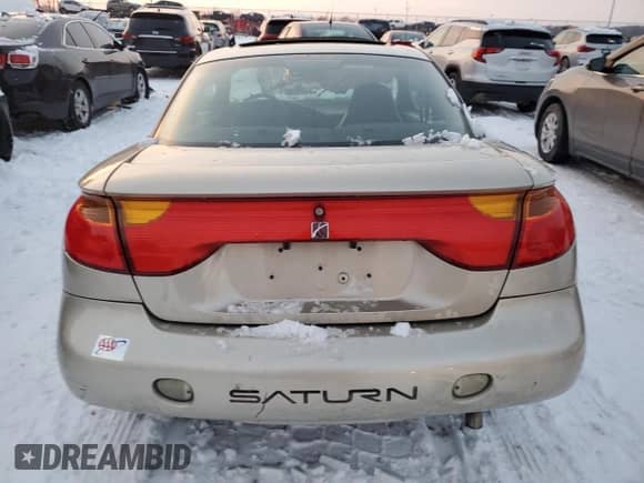 2002 Saturn SC с VIN 1G8ZP12862Z116923, выставлен на аукционе Copart как лот 87684445 с пробегом 90 284 миль миль и Списание • Salvage title. История ставок и продаж доступна на DreamBid. Изображение 6.