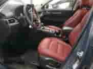 2025 Mazda CX-5 S Carbon Edition z VIN JM3KFBCM0S0599719, wystawiony jako Copart lot #64725555 z przebiegiem 3 501 mil mil oraz Szkoda całkowita • Salvage title. Historia ofert i sprzedaży dostępna na DreamBid. Obrazek 7.