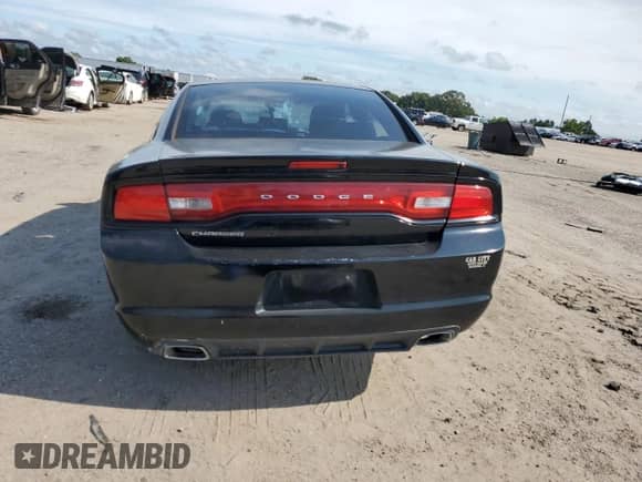 2013 Dodge Charger SE с VIN 2C3CDXBG0DH554990, выставлен на аукционе Copart как лот 67819975 с пробегом 164 226 миль миль и Списание • Salvage title. История ставок и продаж доступна на DreamBid. Изображение 6.